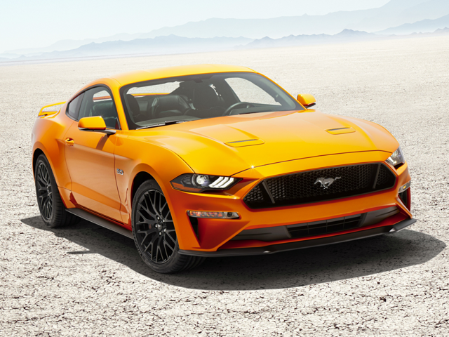 A parked, orange 2023 Ford Mustang | Ford dealer in Jacksonville, AR